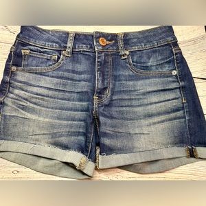 American Eagle Distressed Midi Shorts new without tags not worn or washed.